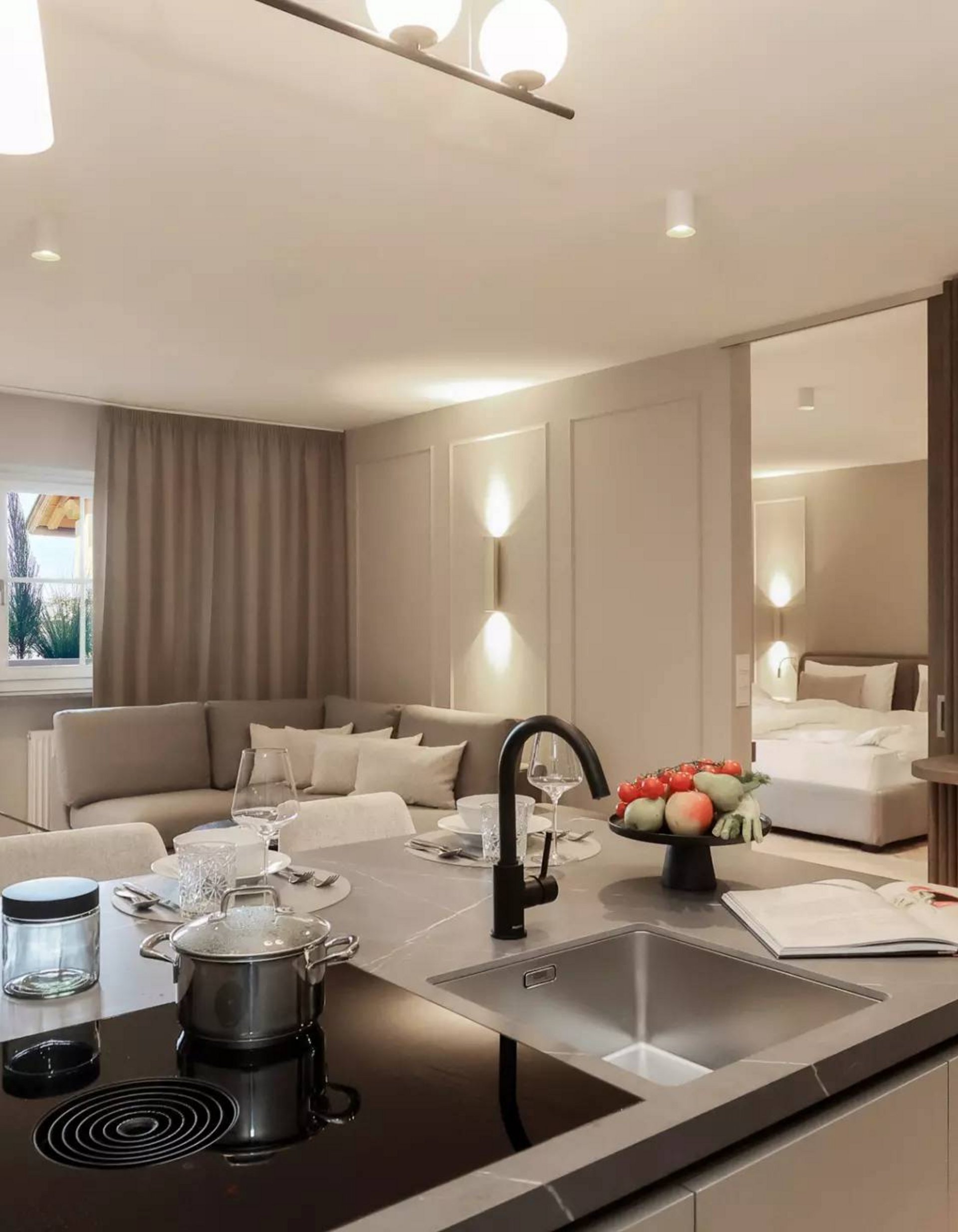 Lingers’ best snapshots Modern open-plan living room and kitchen with integrated sleeping area