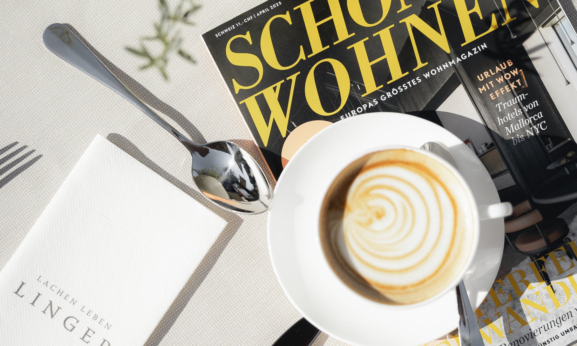 Lingers’ best snapshots Breakfast with cappuccino, croissants and magazine on white table